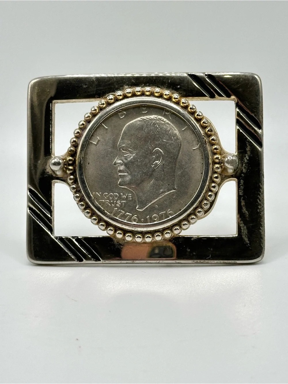 Vintage Eisenhower silver dollar belt buckle.